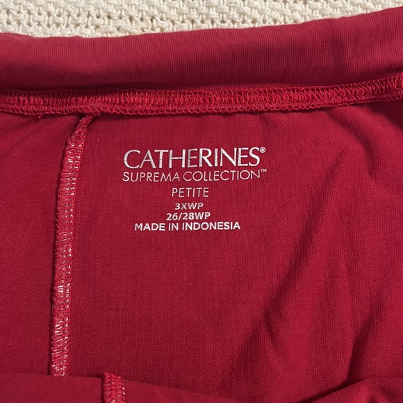 Two pair of capris, by Catherine’s. 1 is stretch denim and 1 is red burgundy. - Picture 2 of 3